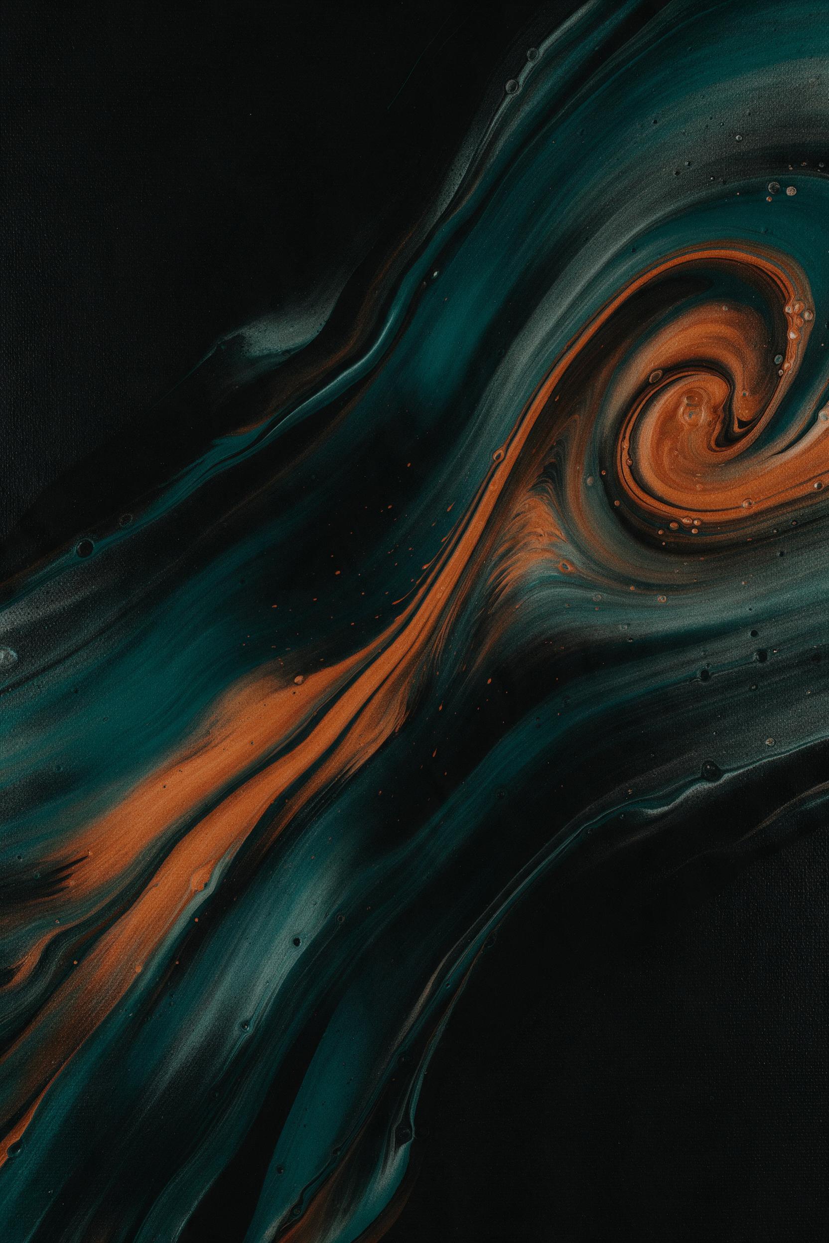 Fluid acrylic swirls in deep teal and burnt orange collide on a matte black canvas, fine bubbles trapped in thick pigment, soft diffused studio light creating glossy highlights, subtle canvas texture visible, minimalist composition with diagonal flow from lower left to upper right.