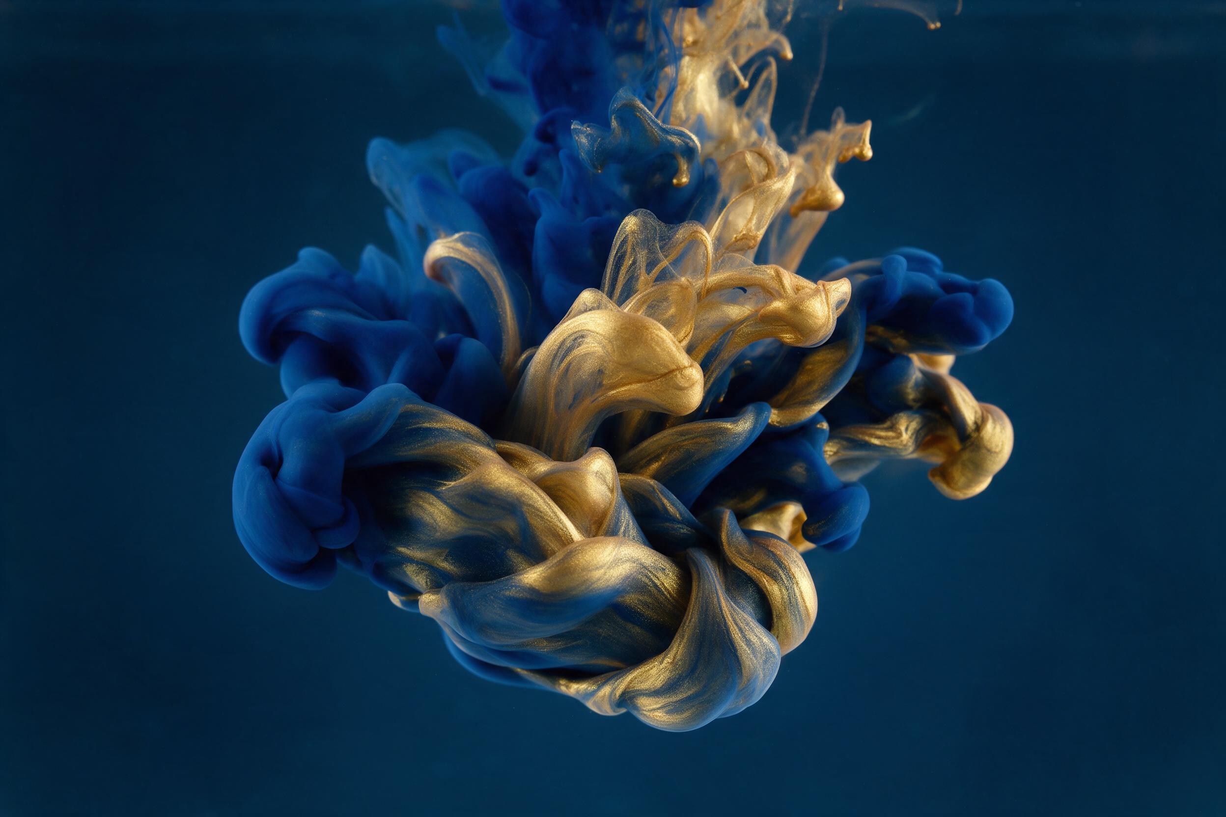 Liquid gold and deep blue ink swirling in a underwater dance, captured with slow shutter speed creating silky motion blur, soft studio lighting from above, minimalist composition with negative space, high contrast, fine art photography style