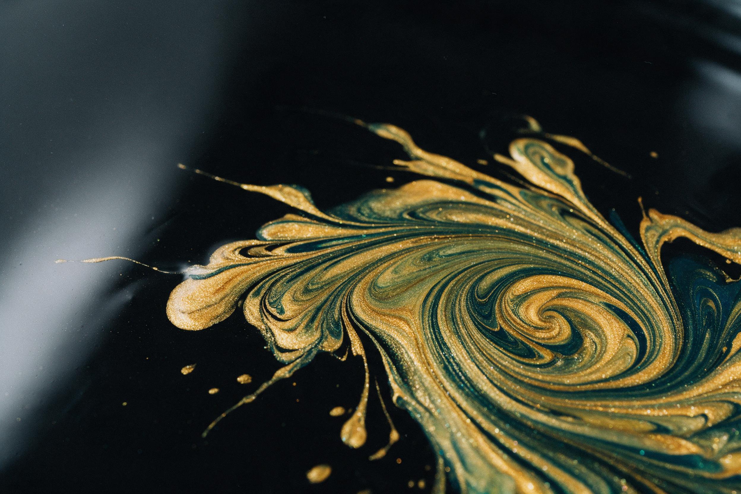 Swirling liquid gold and deep teal paints colliding on black glass surface, macro lens view, captured with subtle film grain, soft studio lighting, dynamic abstract fluid art, minimal composition with negative space