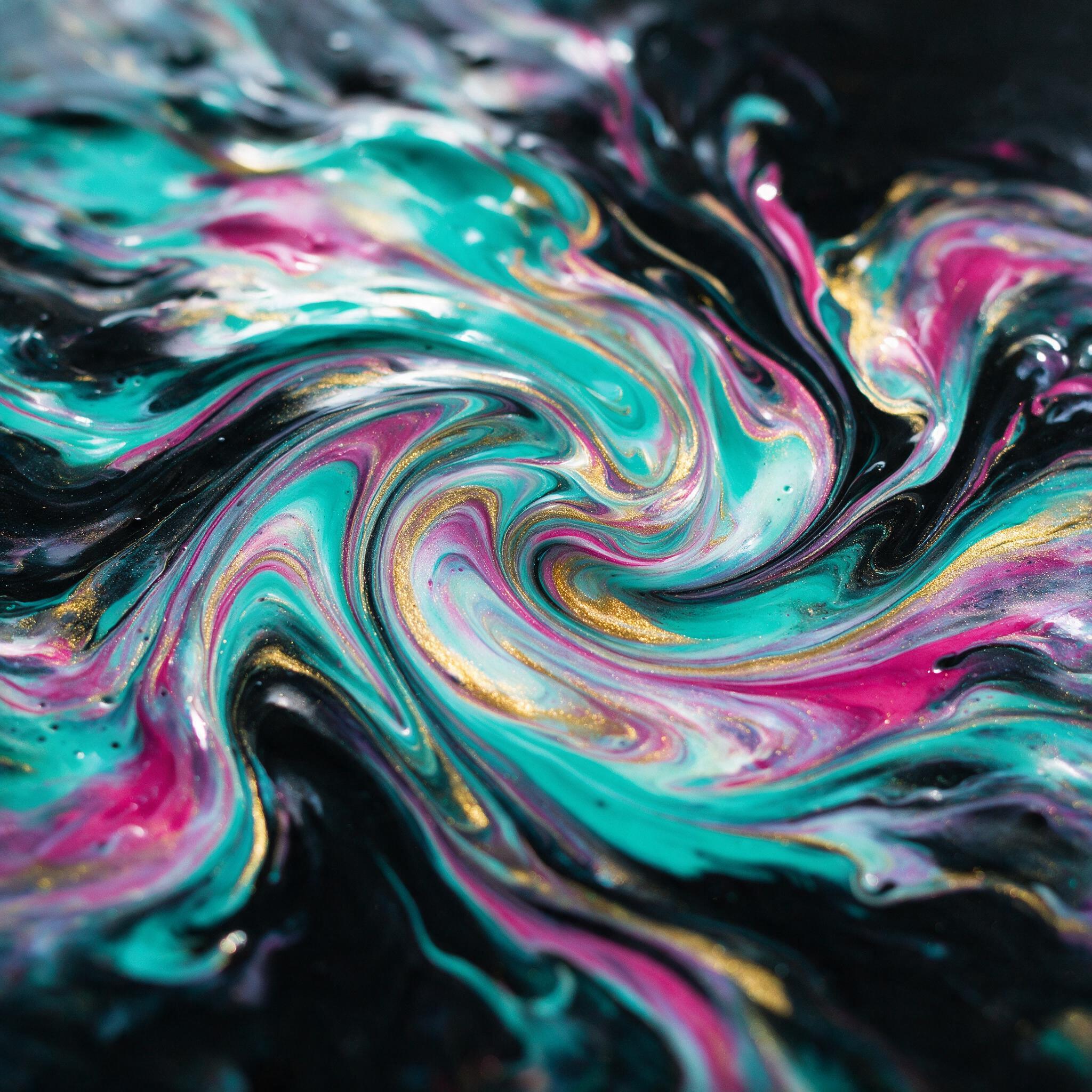 Vibrant fluid art of swirling turquoise, magenta, and gold acrylic paints on a black canvas, macro lens capture with shallow depth of field, natural window light reflecting off glossy wet paint surface, soft ripples and organic curves, minimalist composition, no text or shapes.
