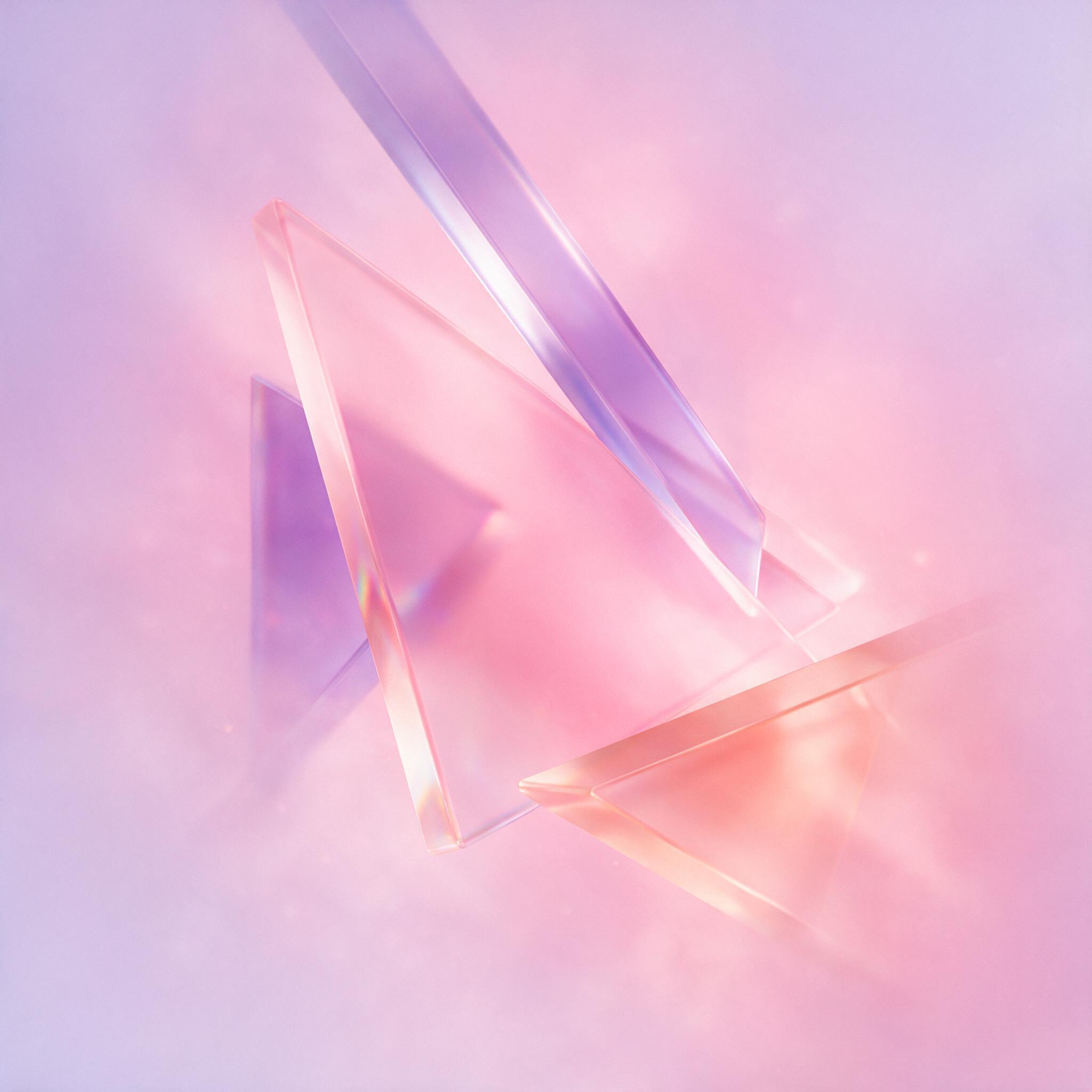 A minimalist composition of translucent geometric prisms intersecting in a soft gradient of pastel pink and lavender, with gentle light reflections and a subtle haze, evoking calm and balance.