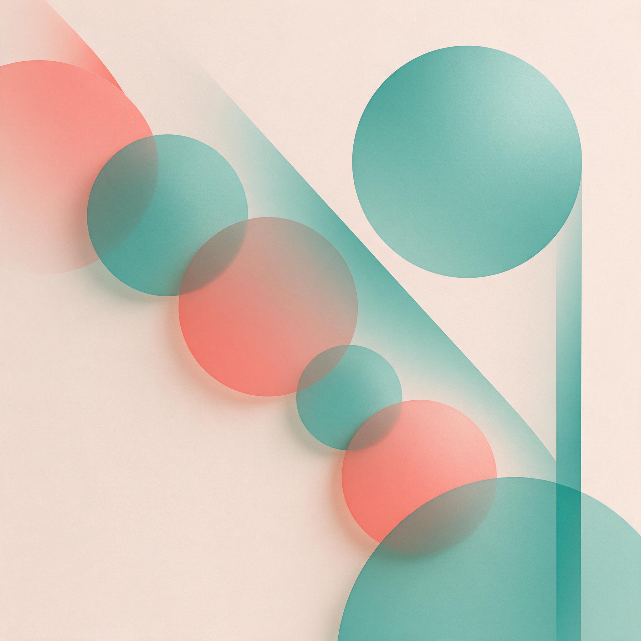 A minimalist geometric composition of overlapping translucent circles in soft coral and teal, contrasting against a pale beige background. Soft diffused lighting creates subtle gradients across matte surfaces, with faint shadows adding depth. The arrangement flows diagonally from upper left to lower