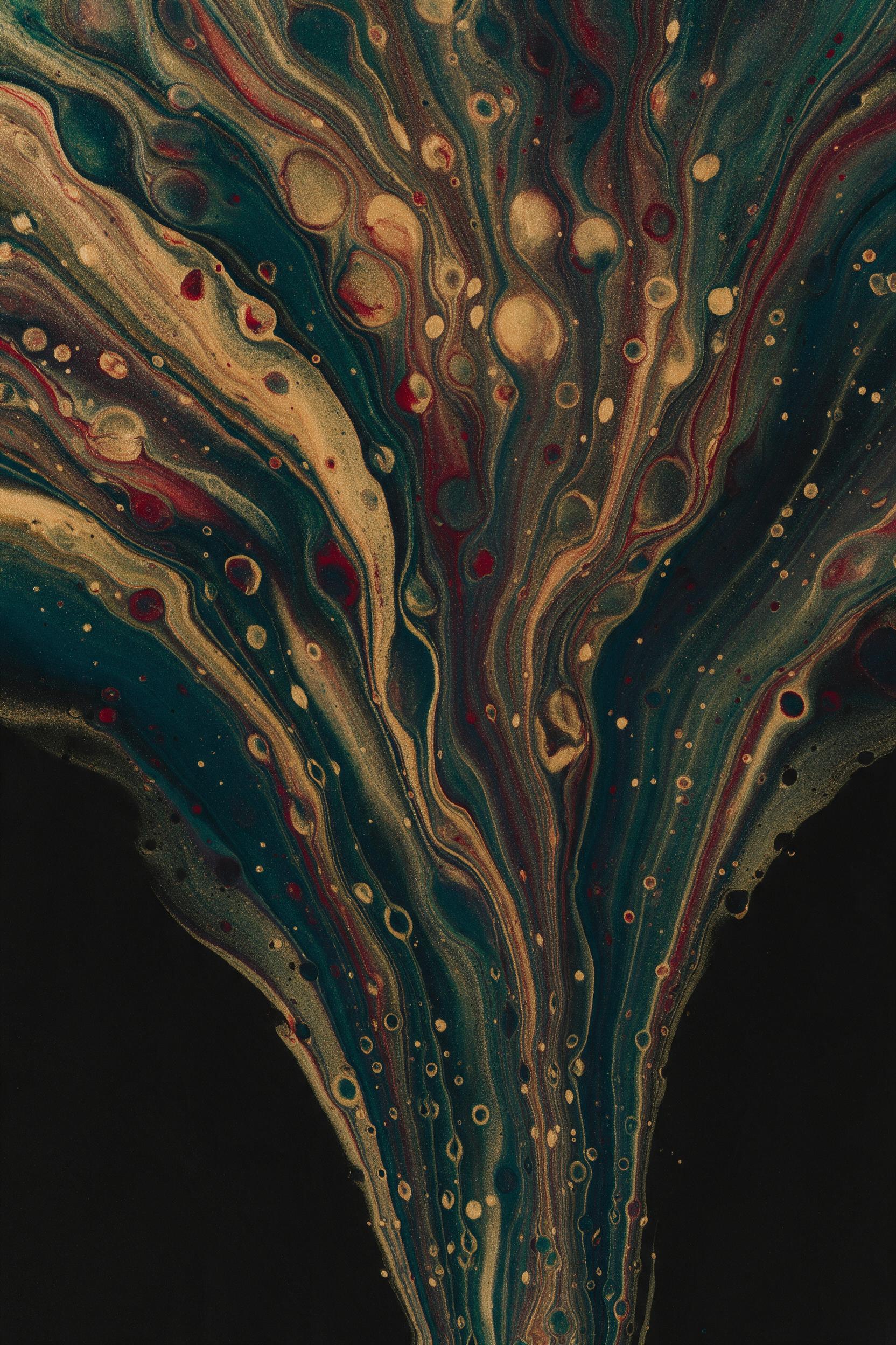 Fluid acrylic pour with overlapping swirls of deep teal, molten gold, and crimson red, forming organic ripples and cells under a single soft studio spotlight, slight surface shimmer, against a matte black background, abstract composition with negative space.